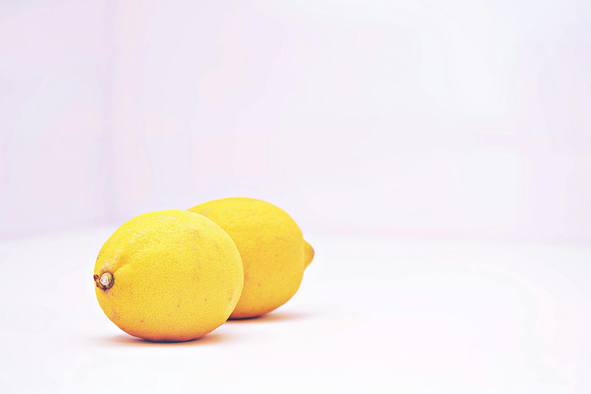 Colorful sex toys on a bright yellow background, representing pleasure and connection without pressure